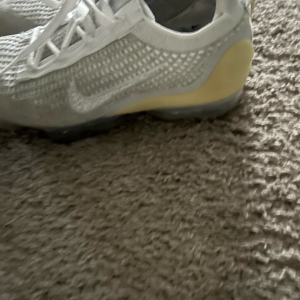 Nike women’s White and Cream Sneakers